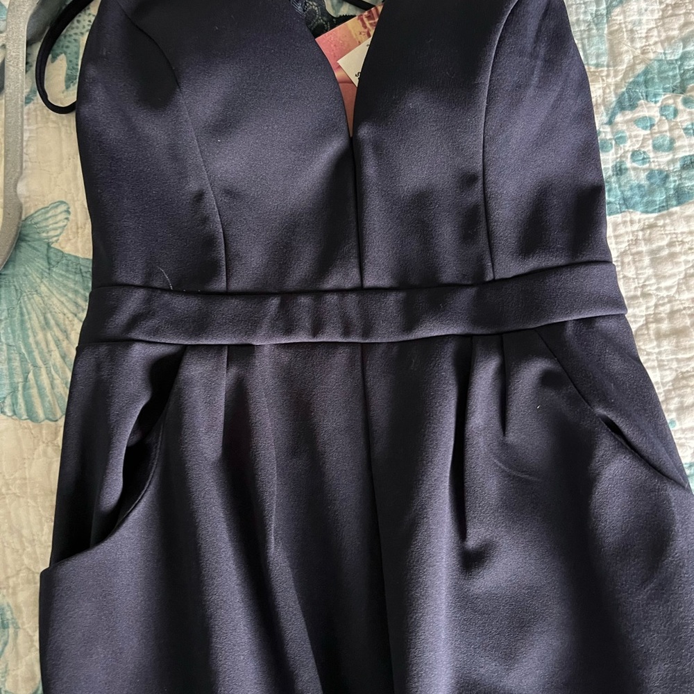 Navy one piece with pants.
